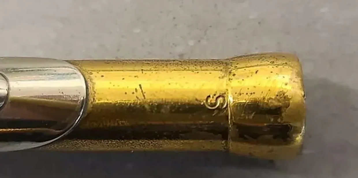 S - Stamped on the receiver